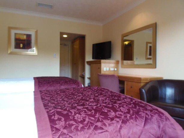 Imagen de la habitación del Hotel Lakeside International. Foto 7