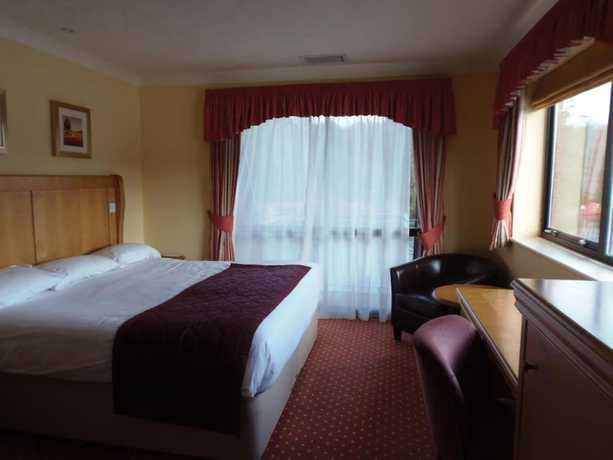 Imagen de la habitación del Hotel Lakeside International. Foto 13