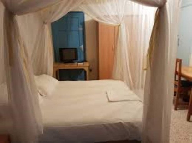 Imagen de la habitación del Hotel Lakeside Tourist Lodge. Foto 15