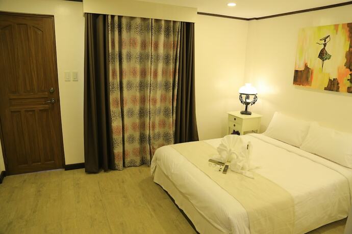 Imagen de la habitación del Hotel Lakeview Suites, Batangas City. Foto 15