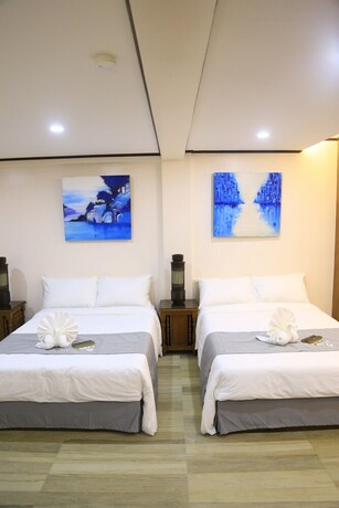 Imagen de la habitación del Hotel Lakeview Suites, Batangas City. Foto 16
