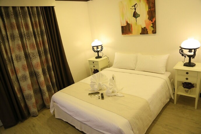 Imagen de la habitación del Hotel Lakeview Suites, Batangas City. Foto 21