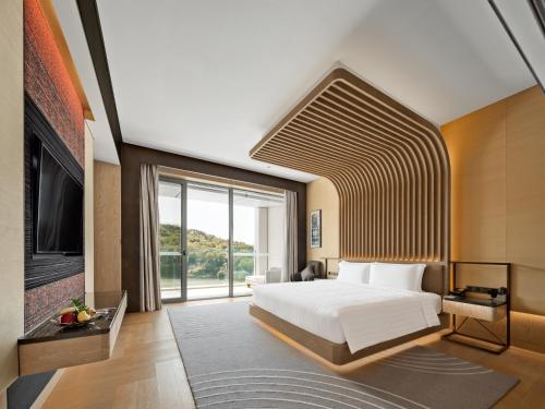Imagen de la habitación del Hotel Lakeview Yulongwan Kunming. Foto 17