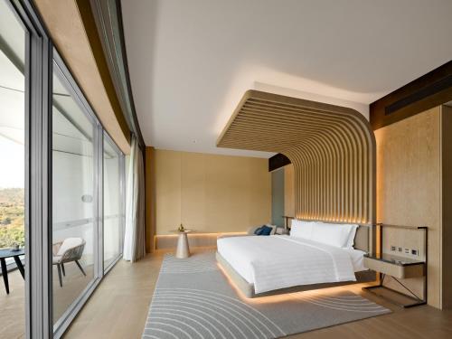 Imagen de la habitación del Hotel Lakeview Yulongwan Kunming. Foto 18