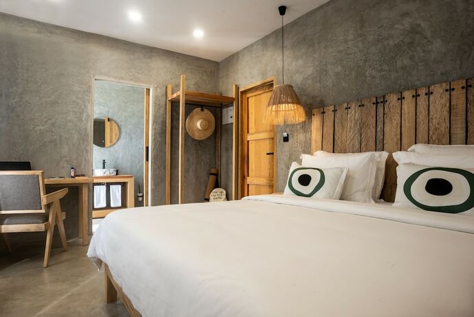 Imagen de la habitación del Hotel LalaGalu. Foto 18