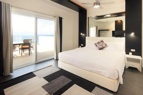 Imagen de la habitación del Hotel Lalaguna Villas Luxury Dive Resort And Spa. Foto 6
