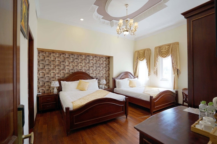 Imagen de la habitación del Hotel Lam Anh Luxury. Foto 7