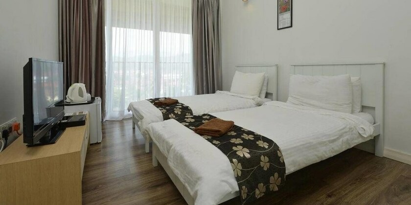 Imagen de la habitación del Hotel Laman Pesona Resort and Spa. Foto 28