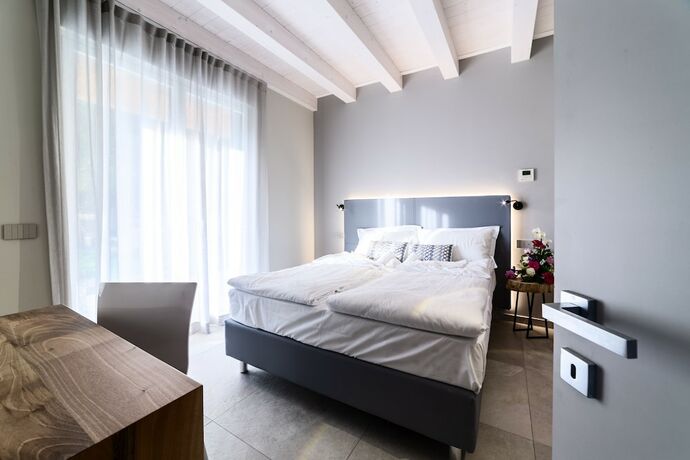 Imagen de la habitación del Hotel Lamasu RioVerde - Lago di Garda. Foto 17