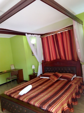 Imagen de la habitación del Hotel Lambada Holiday Resort. Foto 7