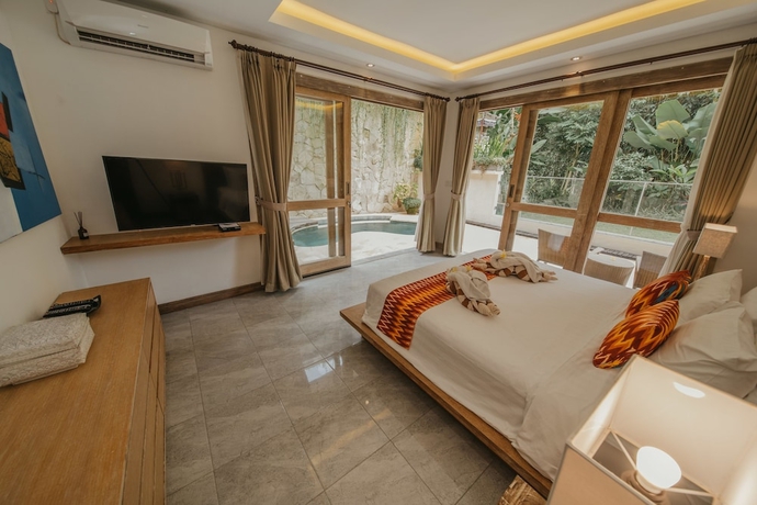 Imagen de la habitación del Hotel Lameli Villas Ubud. Foto 13