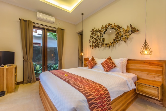 Imagen de la habitación del Hotel Lameli Villas Ubud. Foto 17