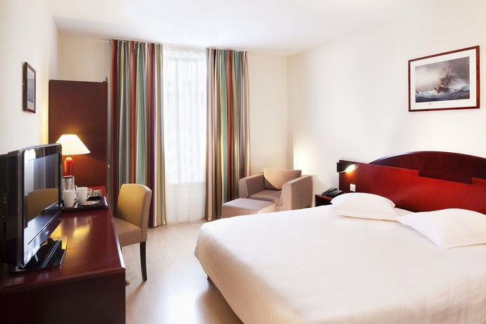 Imagen de la habitación del Hotel L'amirauté. Foto 9