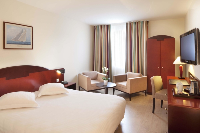 Imagen de la habitación del Hotel L'amirauté. Foto 10