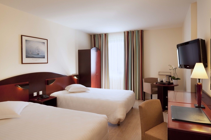 Imagen de la habitación del Hotel L'amirauté. Foto 11