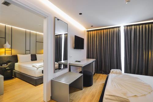 Imagen de la habitación del Hotel L\'amo del mare. Foto 13