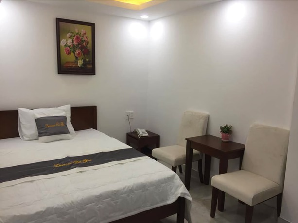 Imagen de la habitación del Hotel L'amour Saigon Hotel. Foto 9