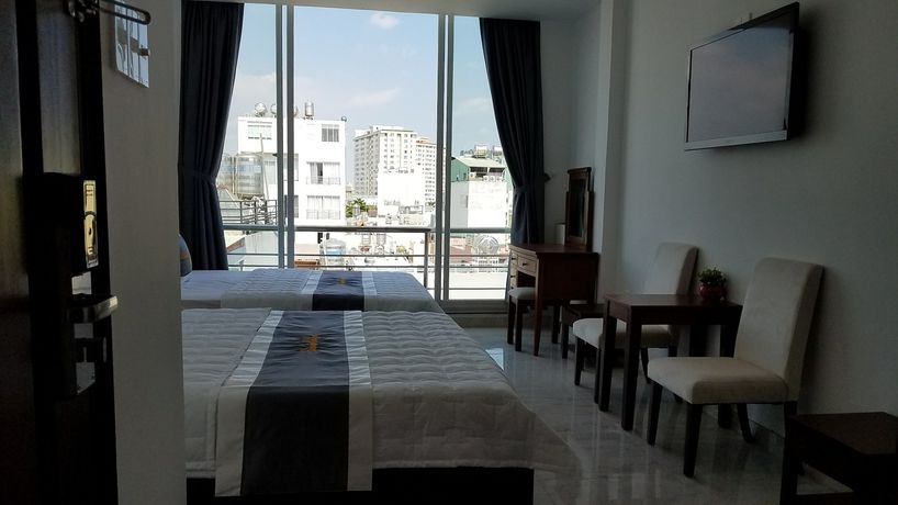 Imagen de la habitación del Hotel L'amour Saigon Hotel. Foto 13