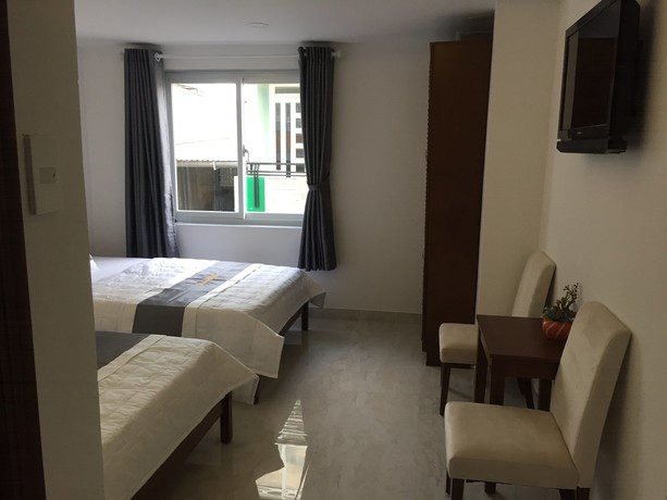 Imagen de la habitación del Hotel L'amour Saigon Hotel. Foto 16