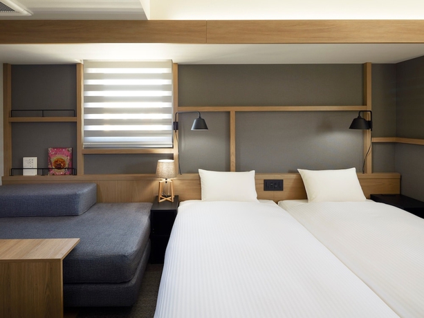 Imagen de la habitación del Hotel Lamp Light Books Sapporo. Foto 7