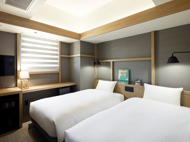 Imagen de la habitación del Hotel Lamp Light Books Sapporo. Foto 10
