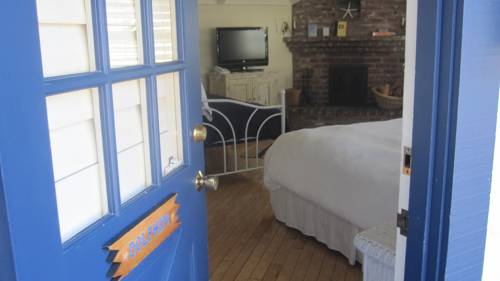 Imagen de la habitación del Hotel Lamp Lighter Inn And Sunset Suites. Foto 11