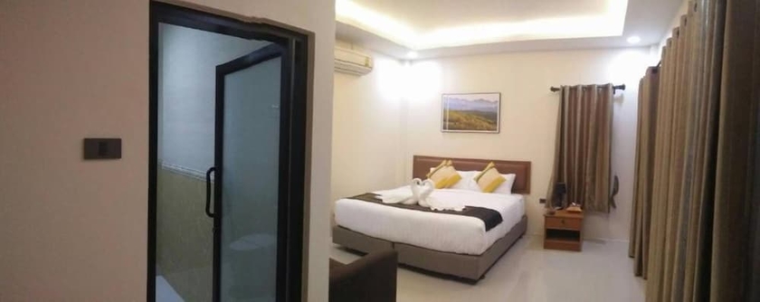 Imagen de la habitación del Hotel Lampang Green Garden Resort. Foto 10