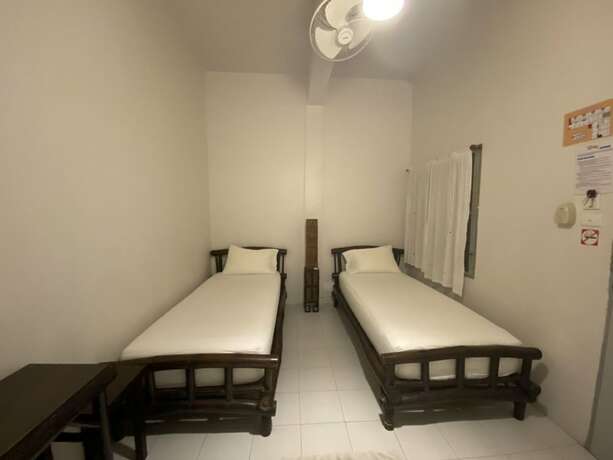 Imagen de la habitación del Hotel Lamphu House Bangkok. Foto 12