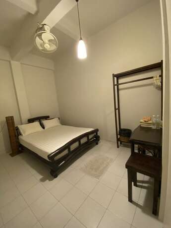Imagen de la habitación del Hotel Lamphu House Bangkok. Foto 16