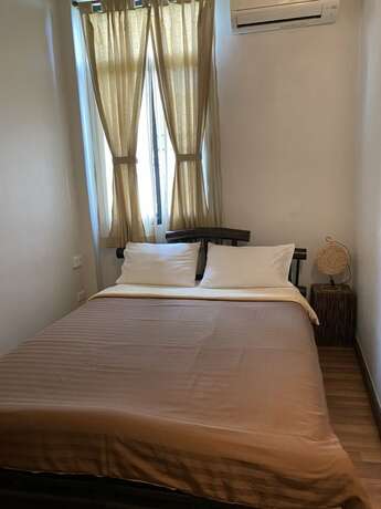 Imagen de la habitación del Hotel Lamphu House Bangkok. Foto 19