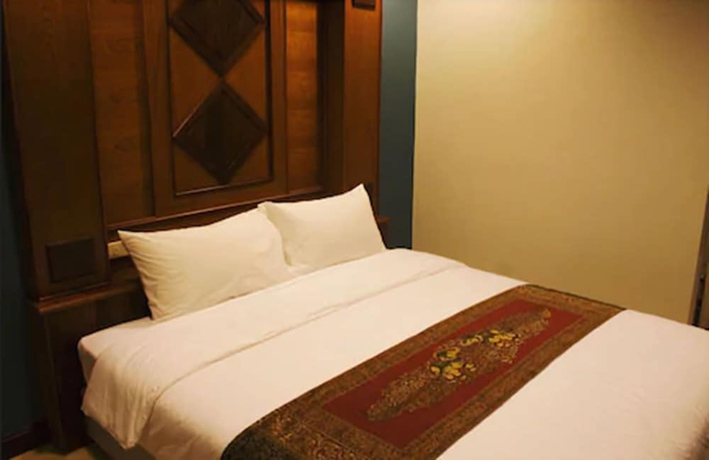 Imagen de la habitación del Hotel Lamphu Tree House Boutique. Foto 6