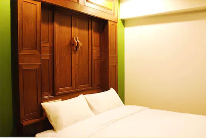 Imagen de la habitación del Hotel Lamphu Tree House Boutique. Foto 7