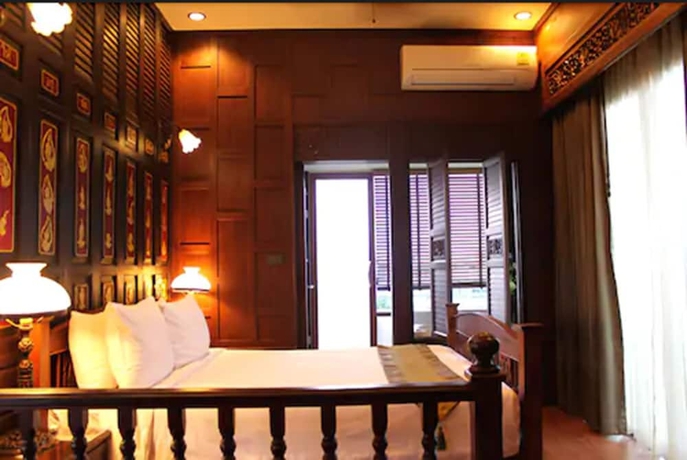 Imagen de la habitación del Hotel Lamphu Tree House Boutique. Foto 10