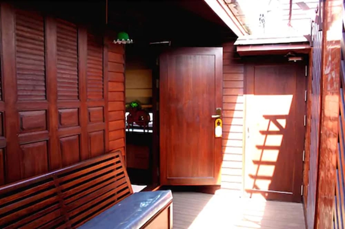 Imagen de la habitación del Hotel Lamphu Tree House Boutique. Foto 14