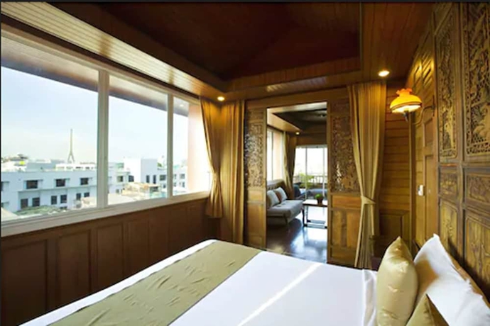 Imagen de la habitación del Hotel Lamphu Tree House Boutique. Foto 15