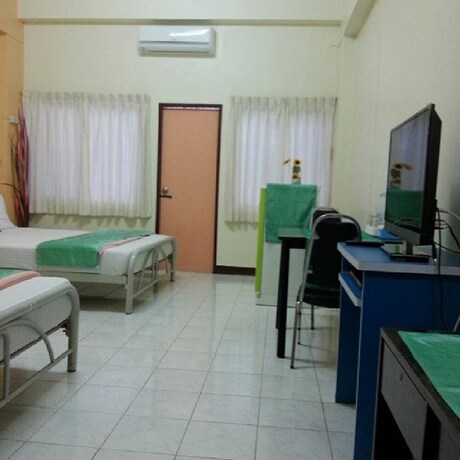 Imagen de la habitación del Hotel Lamphun Place. Foto 18