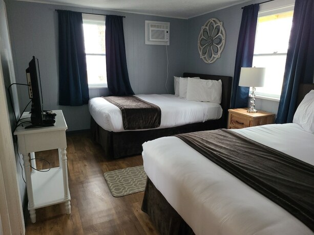 Imagen de la habitación del Hotel Lamplighter Cabins and Suites. Foto 20