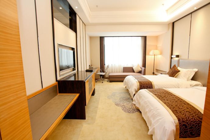 Imagen de la habitación del Hotel Lamtin Longwin Wuhan. Foto 9