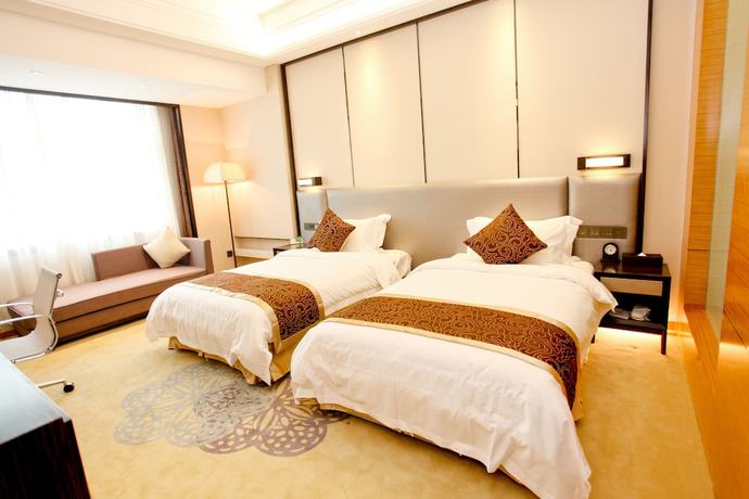 Imagen de la habitación del Hotel Lamtin Longwin Wuhan. Foto 11