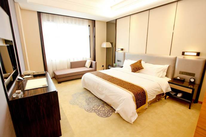 Imagen de la habitación del Hotel Lamtin Longwin Wuhan. Foto 16