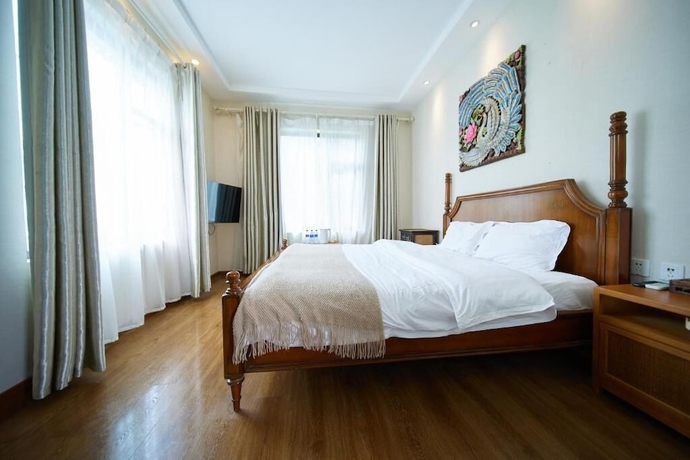 Imagen de la habitación del Hotel LanNa, Dali. Foto 2