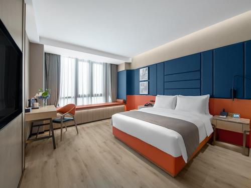 Imagen de la habitación del Hotel LanOu Changsha Wuyi Square. Foto 13