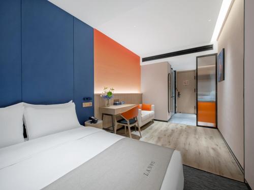 Imagen de la habitación del Hotel LanOu Changsha Wuyi Square. Foto 15