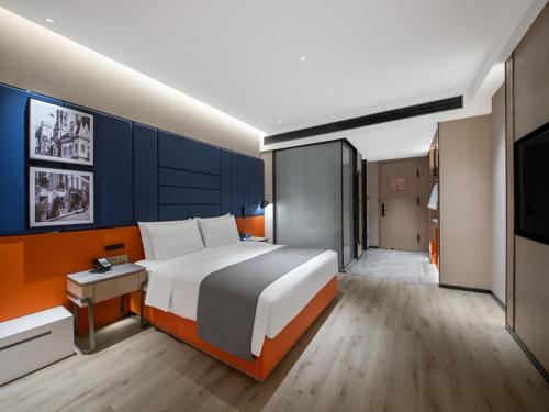 Imagen de la habitación del Hotel LanOu Changsha Wuyi Square. Foto 17