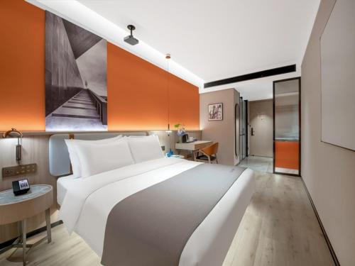 Imagen de la habitación del Hotel LanOu Changsha Wuyi Square. Foto 19
