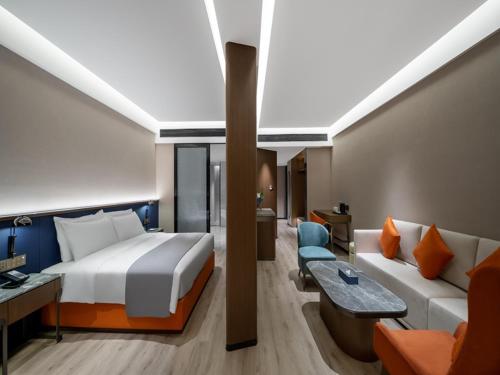 Imagen de la habitación del Hotel LanOu Changsha Wuyi Square. Foto 20