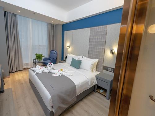 Imagen de la habitación del Hotel LanOu Hotel Qingdao Huangdao District Xinjiekou. Foto 18