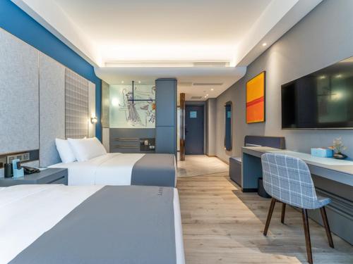 Imagen de la habitación del Hotel LanOu Hotel Qingdao Laixi Development Zone Beijing Road. Foto 2