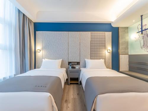 Imagen de la habitación del Hotel LanOu Hotel Qingdao Laixi Development Zone Beijing Road. Foto 3