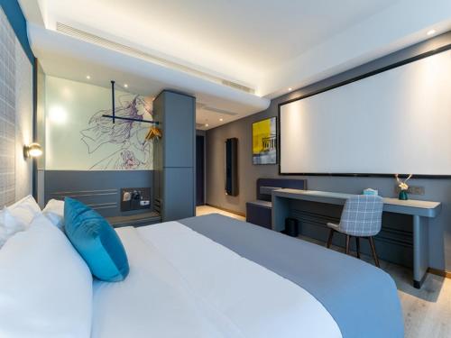 Imagen de la habitación del Hotel LanOu Hotel Qingdao Laixi Development Zone Beijing Road. Foto 4